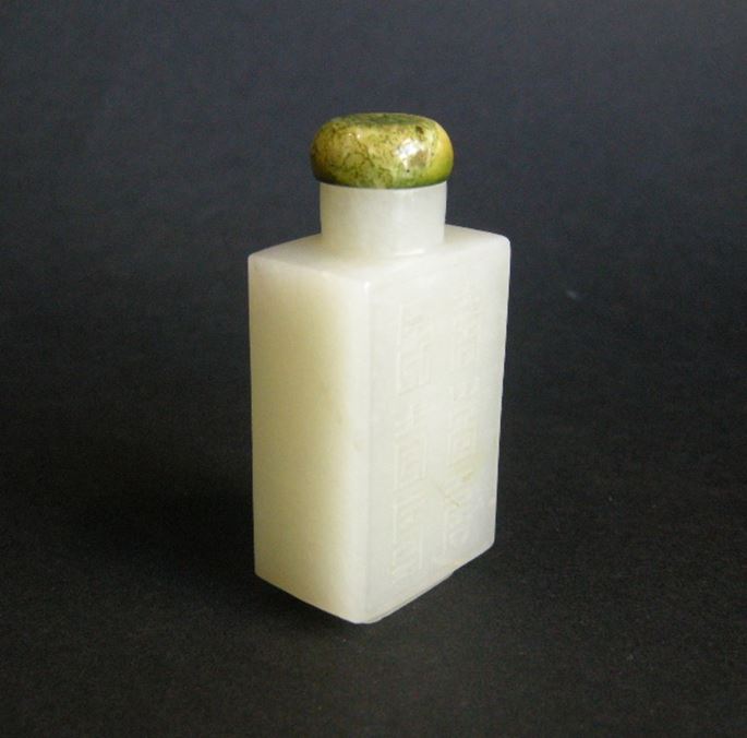 Rectangular shaped light green jade snuff bottle carved on each side with shou signs | MasterArt